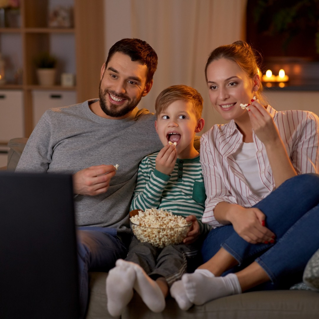 Family watching movie together