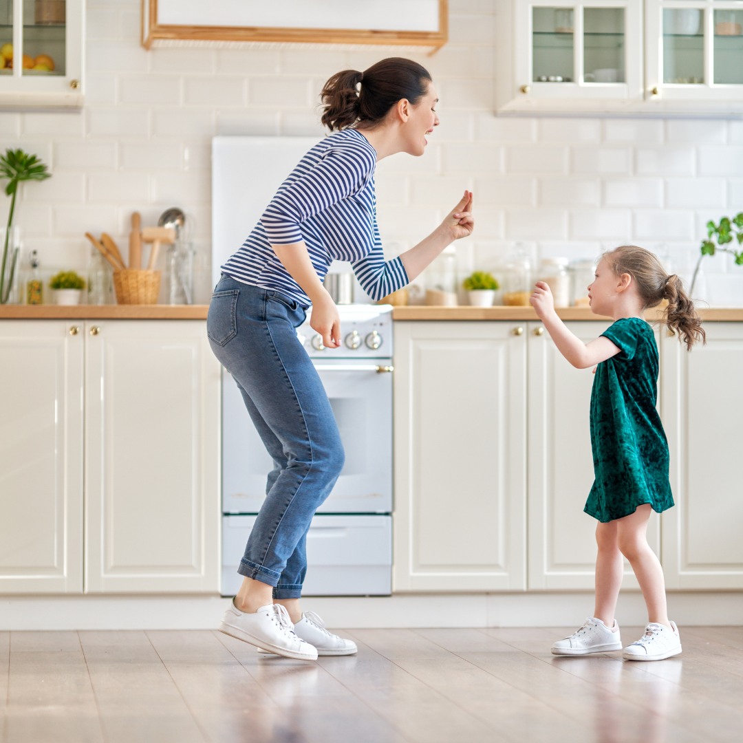 Mom and daughter dancing